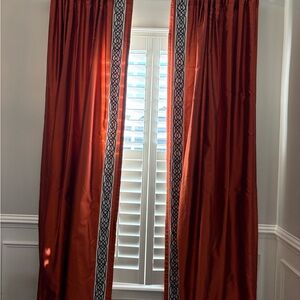Elegant Rust Curtains with Decorative Trim